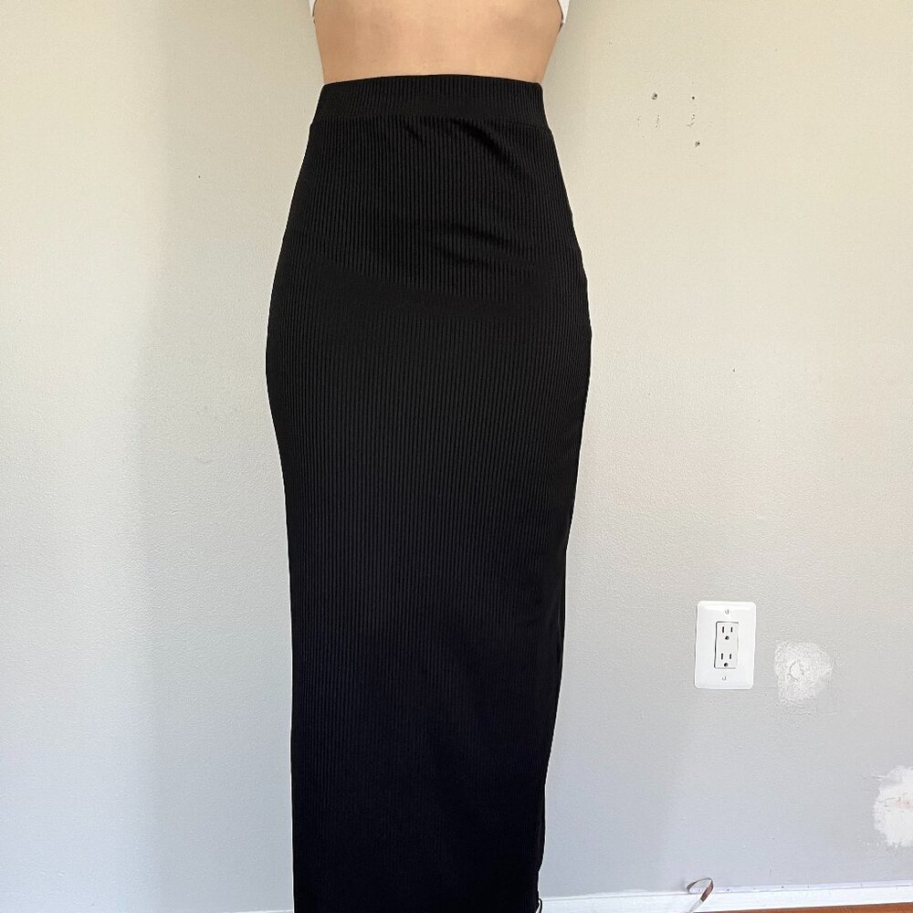 High-waisted, black, ribbed knit maxi skirt.